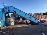 PAAL Konti fully auto tie baler and conveyor